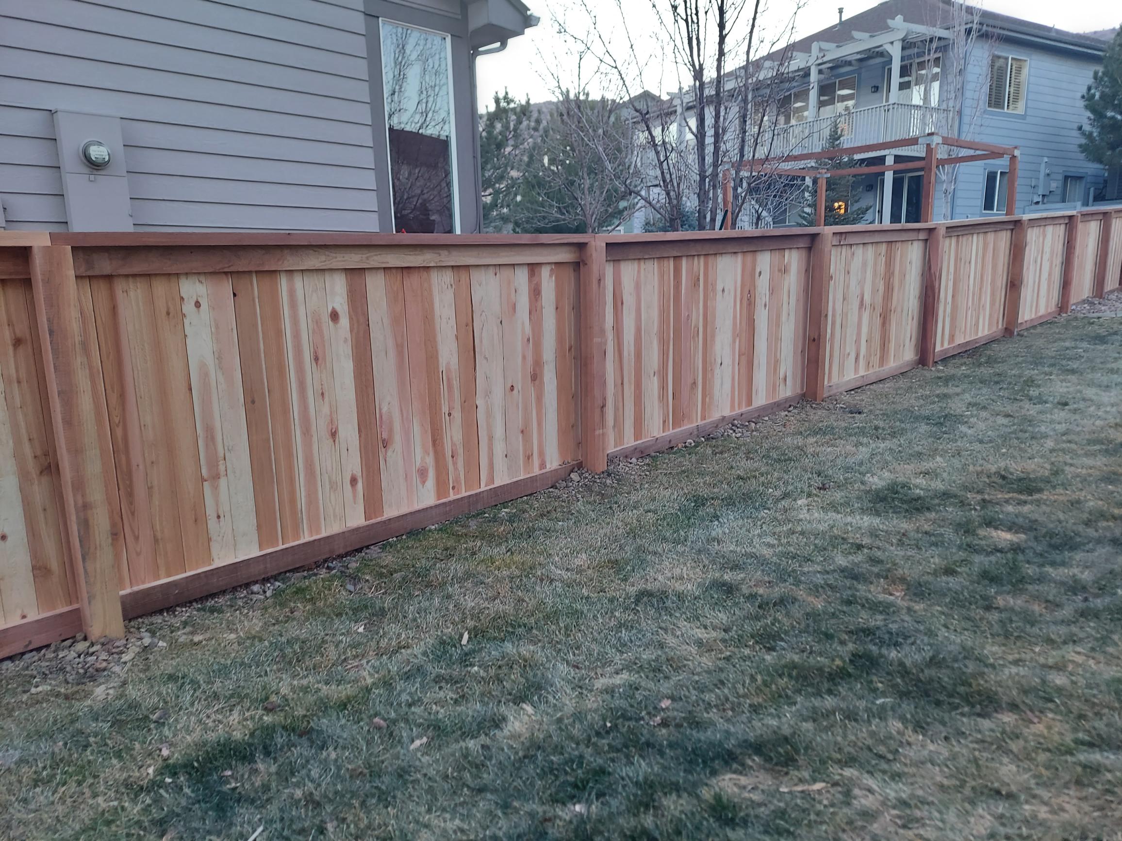 Cedar privacy fence with top cap and fascia, Highlands Ranch
