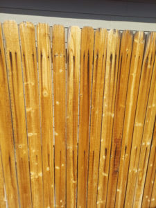 rust streaked wooden fence