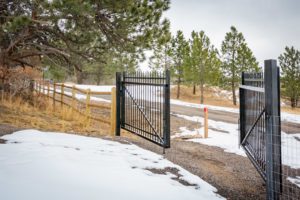 Round Rail Fence with Iron Swing Gate