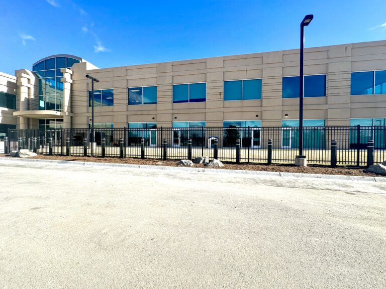 Ornamental iron fence and parking bollards CO Christian Academy