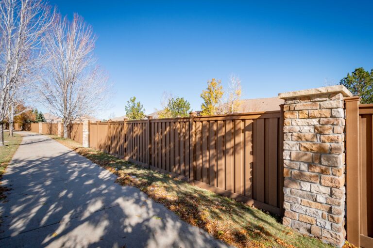 Custom Stone Pillars and Trex Fencing