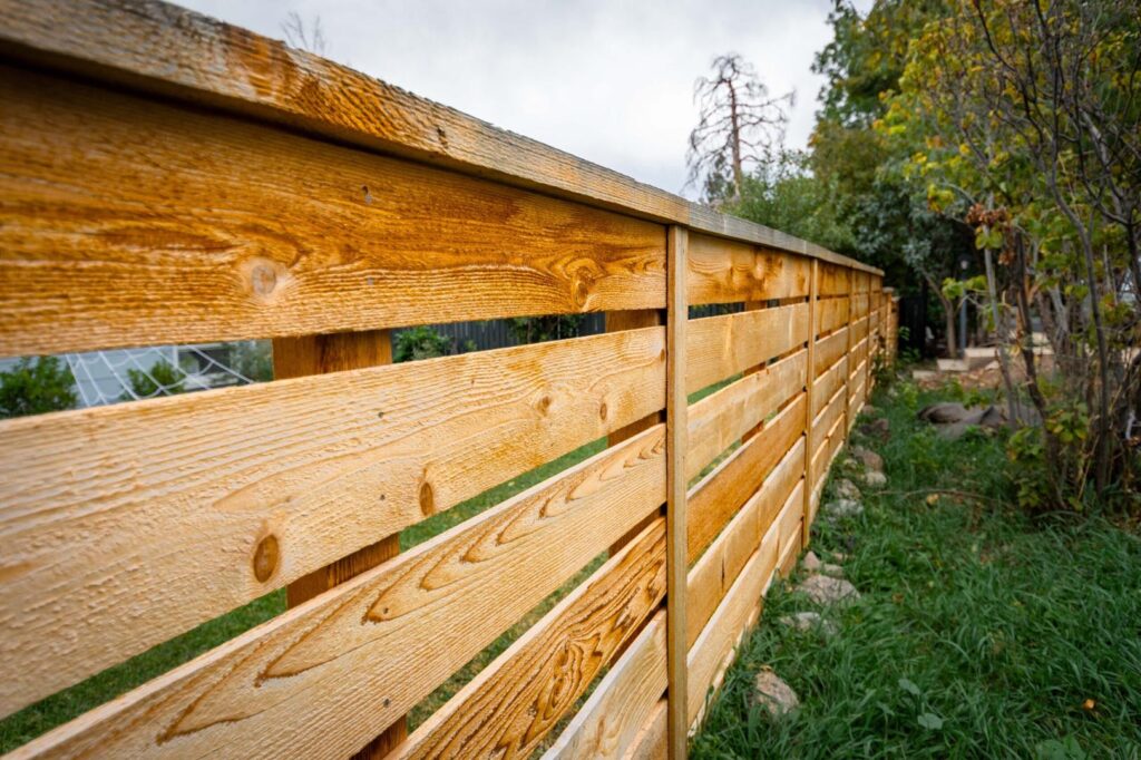 24 cedar fence boulder1