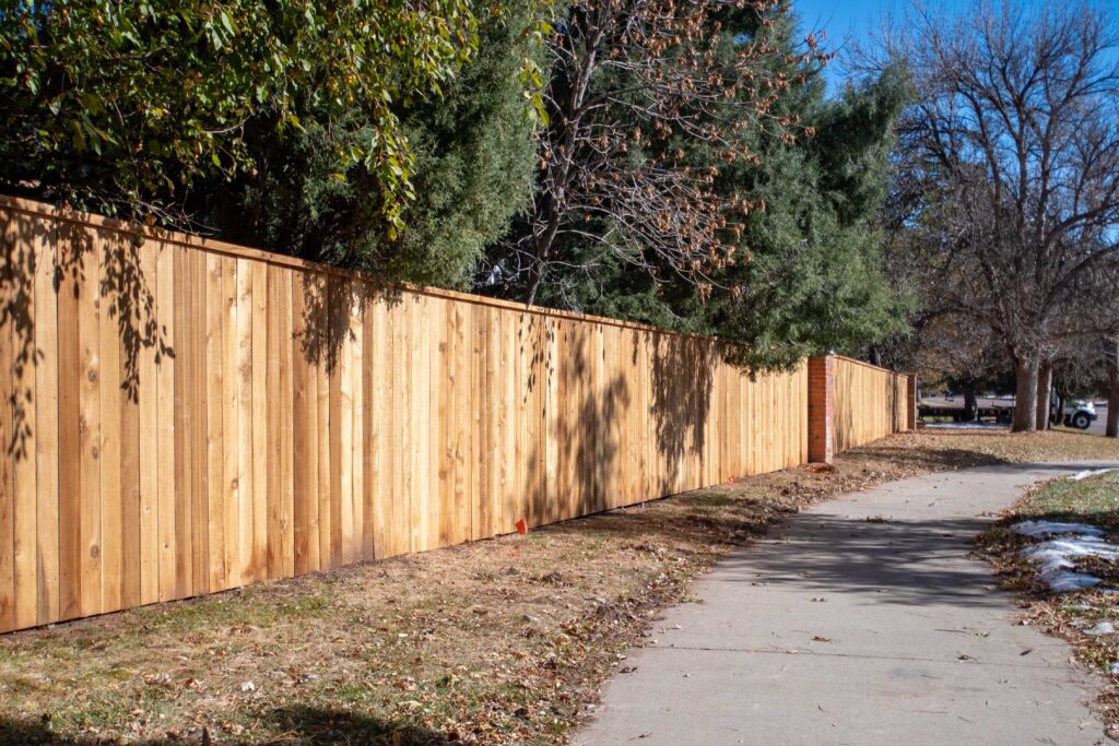 Cedar Fence with Stone Columns - Ken-Caryl HOA