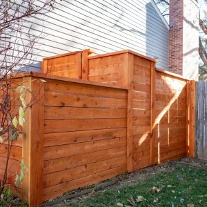Horizontal Cedar fence with Top Cap and Cedar Stain Longmont