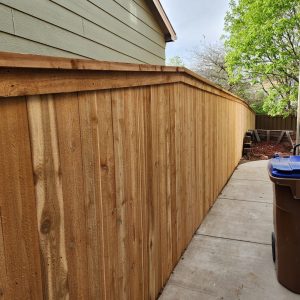 Cedar fence with top cap