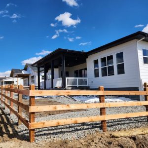 Cedar open rail fence with wire
