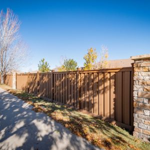 Custom Stone Pillars and Trex Fencing