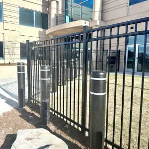 Ornamental iron fence and parking bollards CO Christian Academy