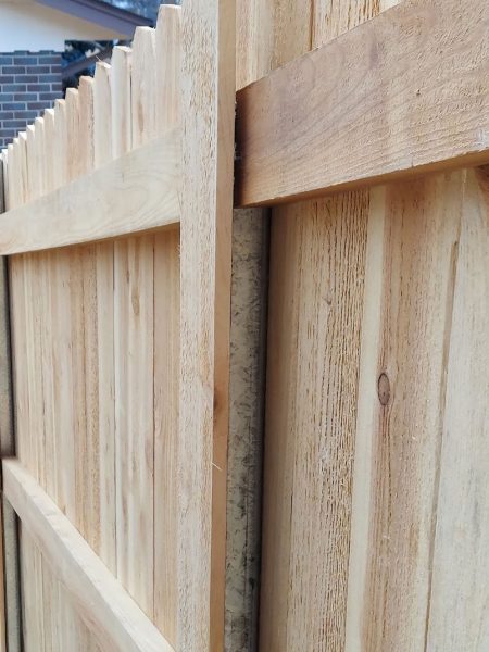 Cedar fence with a hidden steel post